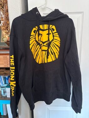 Disney Men’s Black Zip-Up Hoodie with Bold Yellow Lion Graphic